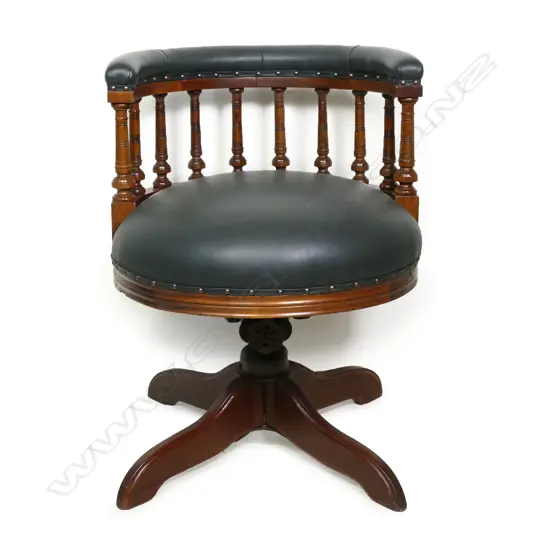 A c.1900  walnut spindle back desk chair,