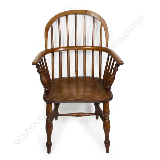 An unusual small proportion 19thC elm hoop back Windsor armchair,