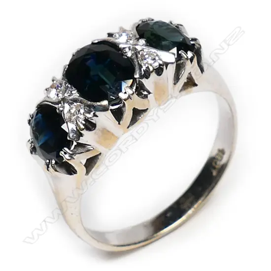 An 18ct white gold, tourmaline and diamond ring,