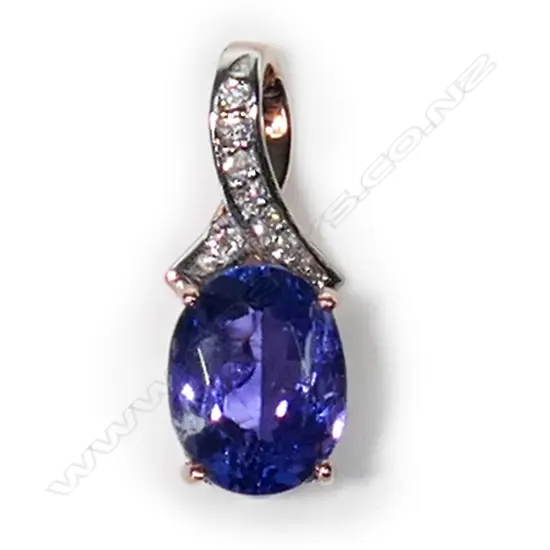 A 14ct rose gold, tanzanite and diamond vintage style pendant,