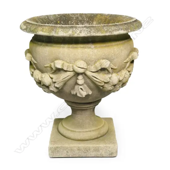 A large classical fine concrete pedestal planter,