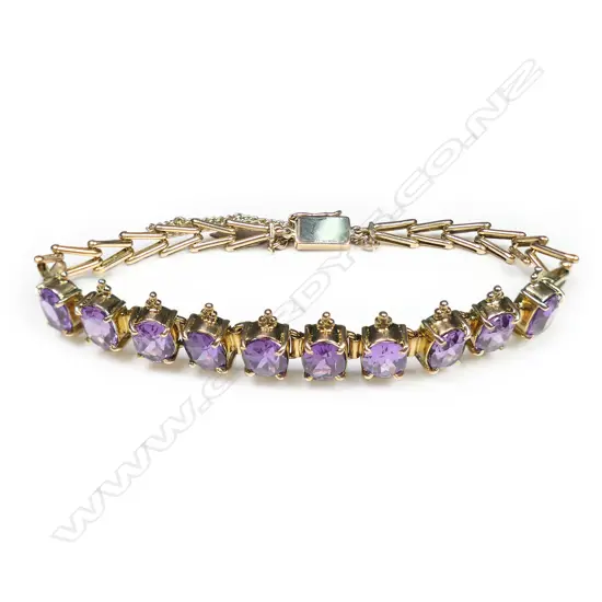 A vintage 9ct yellow gold and faux alexandrite bracelet,