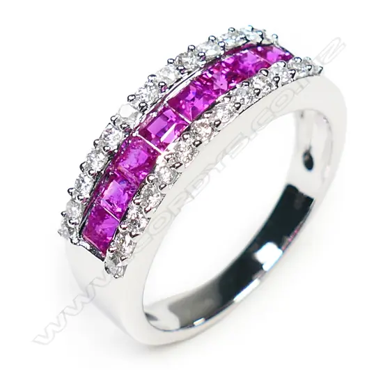 An 18ct white gold ruby and diamond ring,