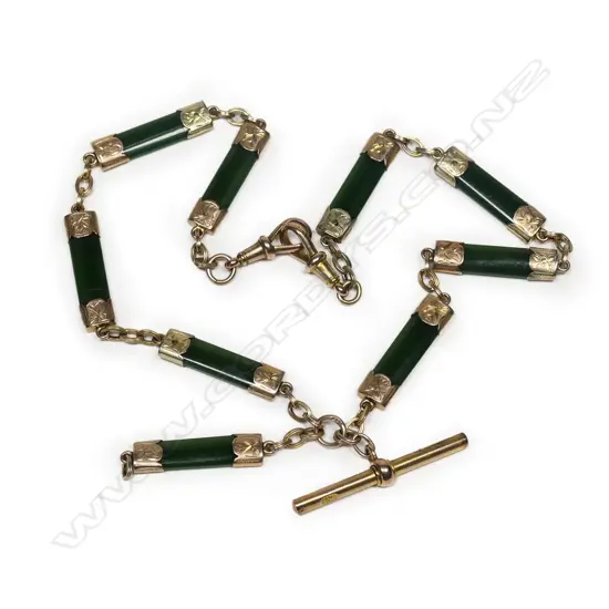 A c.1900 9ct. gold and pounamu fob chain,