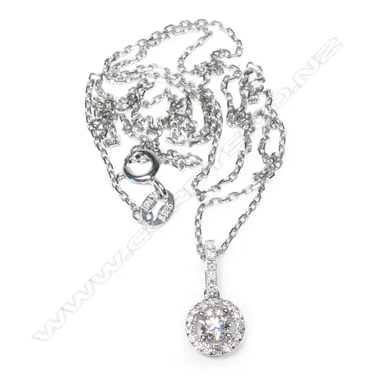 An 18ct white gold and diamond pendant,