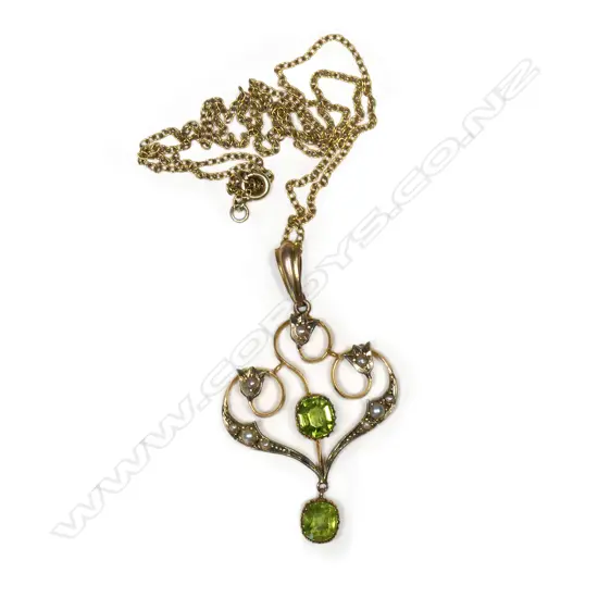 An Edwardian 9ct peridot and seed pearl pendant on chain,