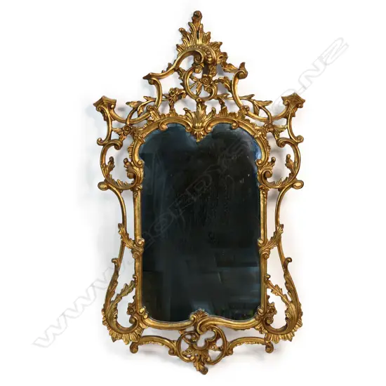 An ornate French style mirror,