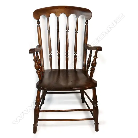 A 19thC beech and elm Windsor-style armchair,