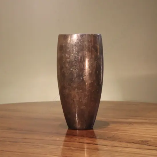 An Indian brass vase