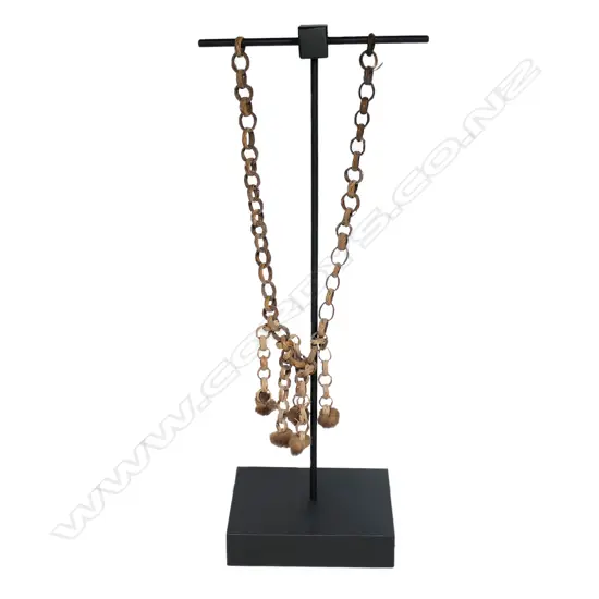 A 1986 PNG Mount Hagen fertility fetish necklace,