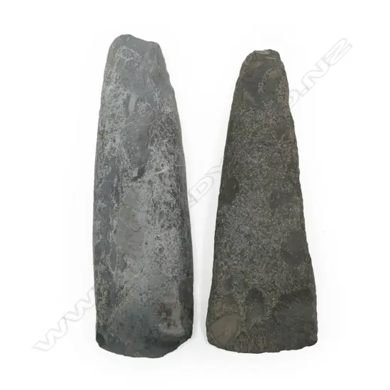 Two large early stone adzes,
