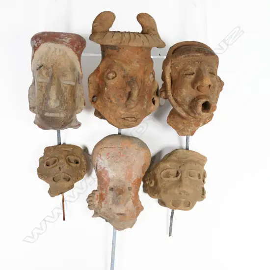 A Group of six Pre-Columbian Portrait Masks,