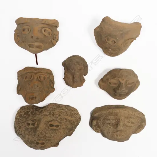 A Group of Seven Pre-Columbian Portrait Masks,