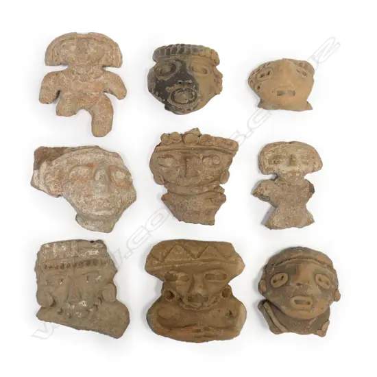 A Group of Nine Pre-Columbian Portrait Masks,