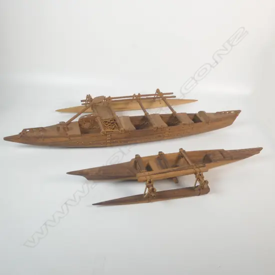 Two models of Polynesian canoes