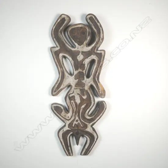 A carved spirit figure,