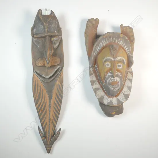 Two carved Papua New Guinea masks,