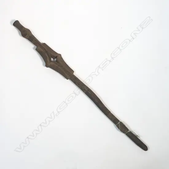 A carved Papuan staff,