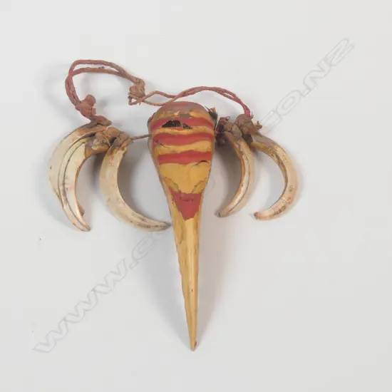 A Hornbill and Tusk pendant necklace,