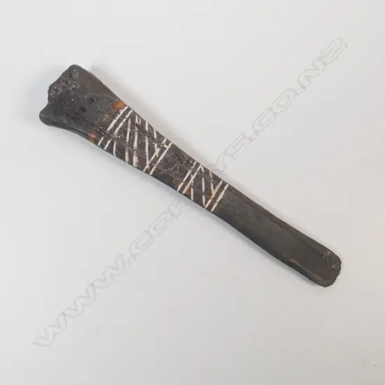 A Cassowary bone spatula,