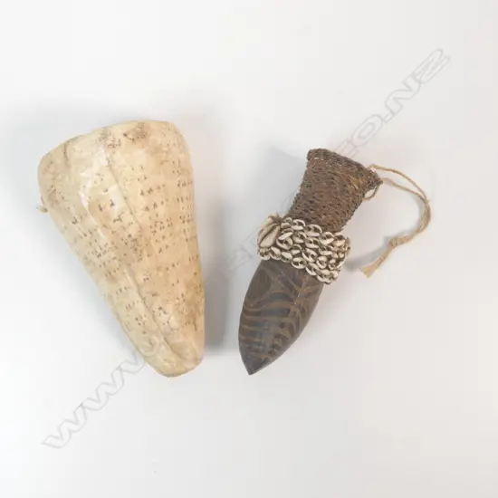 A Papua New Guinea penis sheath and shell,