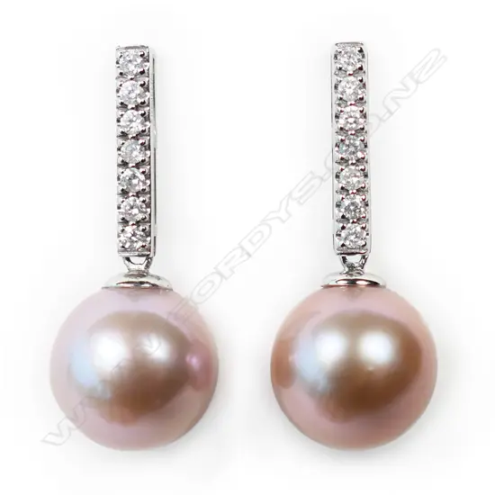 A pair of 14ct white gold pearl and diamond drop earrings,