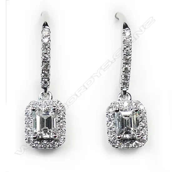 A pair of 18ct white gold and diamond earrings,