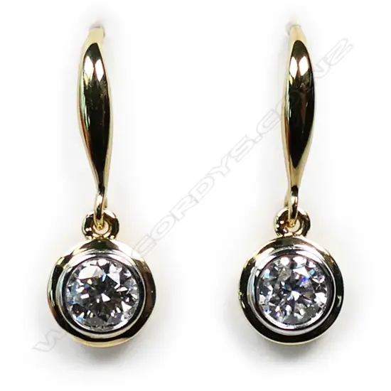 A pair of 18ct gold and diamond earrings,