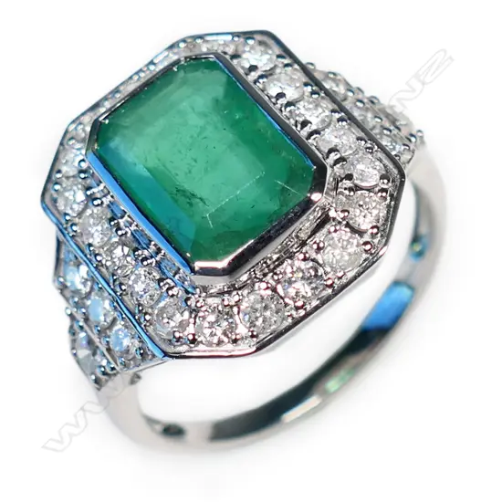 A 14ct white gold, emerald and diamond Art Deco style ring,