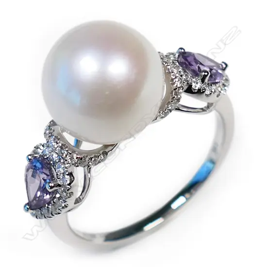 A 14ct white gold pearl, purple sapphire and diamond vintage style ring,