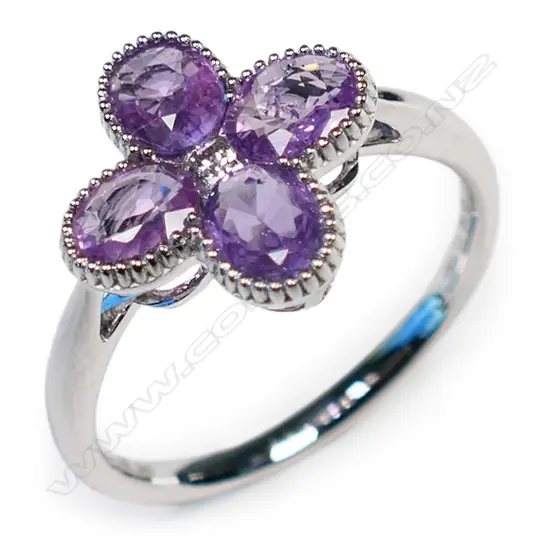 A 14ct white gold pink Ceylonese sapphire and diamond ring,