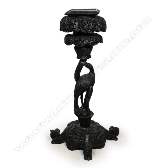 An Indian hardwood vase stand,