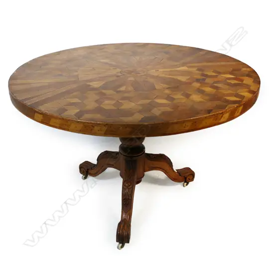 An unusual 19thC NZ colonial and English parquetry tilt top dining table,