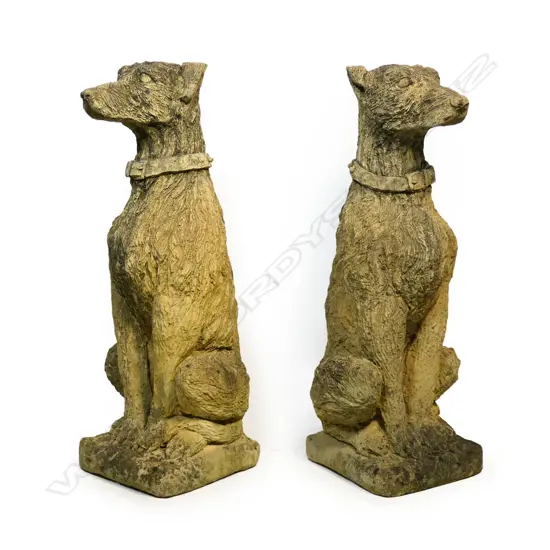 A pair of church stone deer hounds,