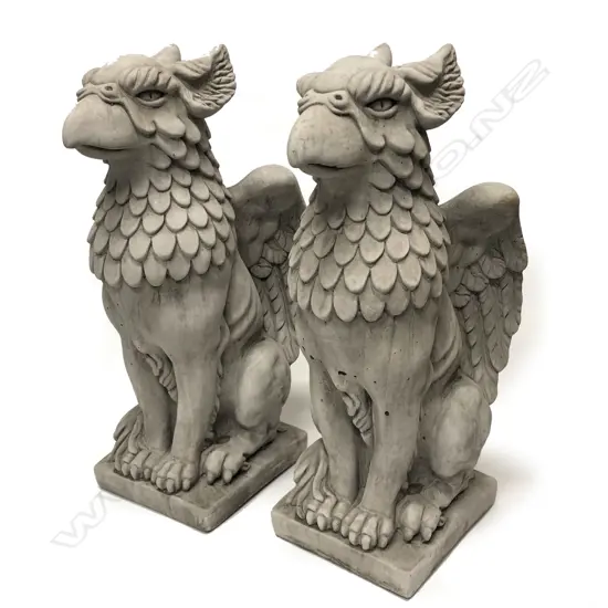 A pair of fine concrete garden/entrance seated griffins