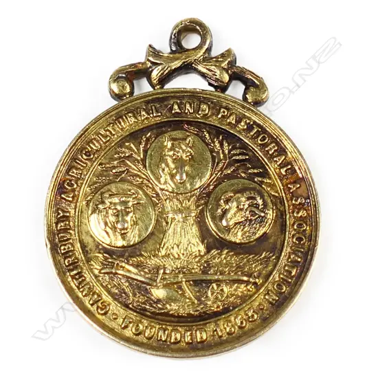 A 1907 'CANTERBURY AGRICULTURAL AND PASTORAL ASSOCIATION FOUNDED 1863' gilded 15ct gold medal,