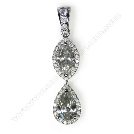 A 14ct white gold diamond double drop pendant,