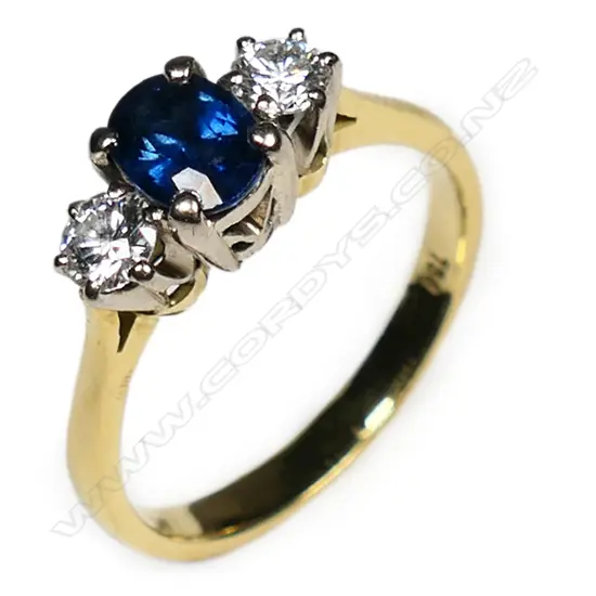 An 18ct yellow gold sapphire and diamond ring,