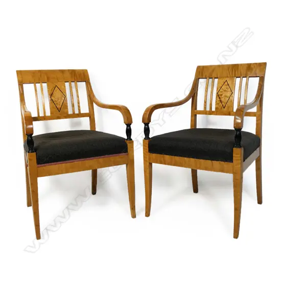 A pair of 19thC satinwood carver chairs,