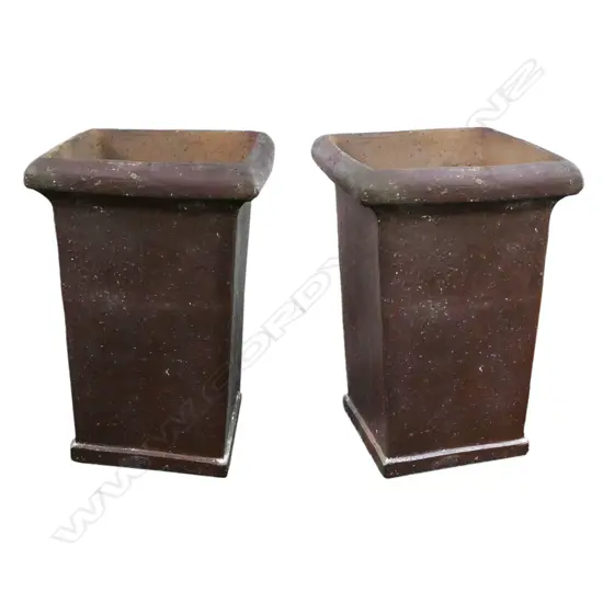 A pair of tall ironstone garden planters,