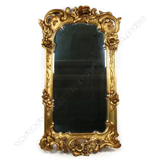 An antique style ornate gilt console mirror,