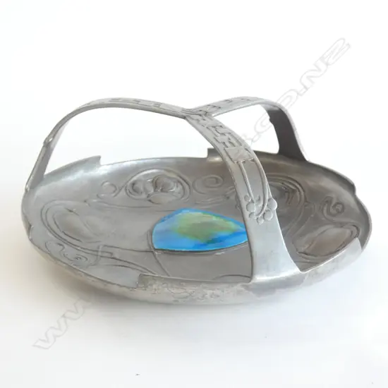 A 1903 Tudric Pewter 'Bollelin' tray with strap handles, designed by Archibald Knox for Liberty & Co.,
