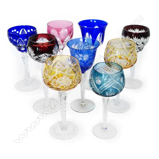 A harlequin set of nine Bohemian long stemmed wine glasses,