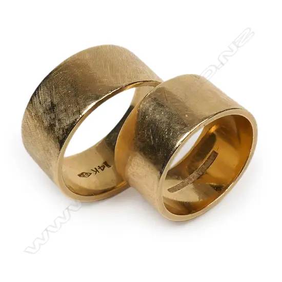 A pair of vintage 14ct yellow gold designer wedding rings,