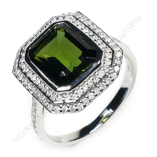A 14ct white gold tourmaline and diamond double halo ring,