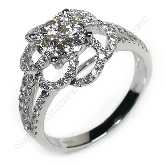 An 18ct white gold diamond cluster ring,