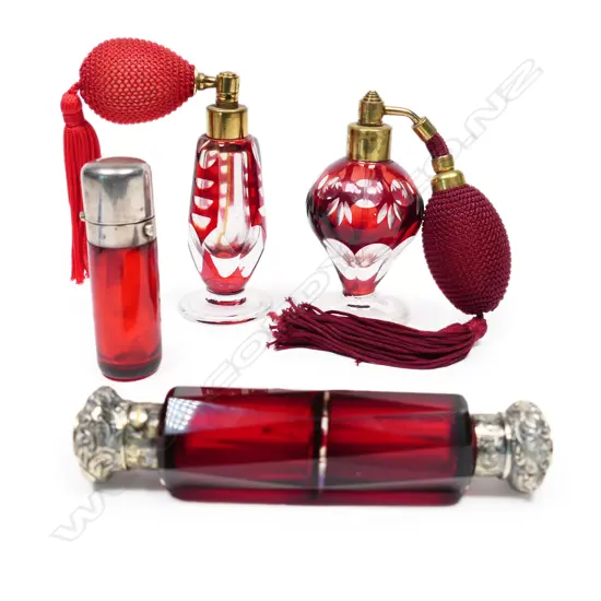 Four antique perfume bottles,