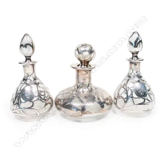 Three antique perfume bottles,