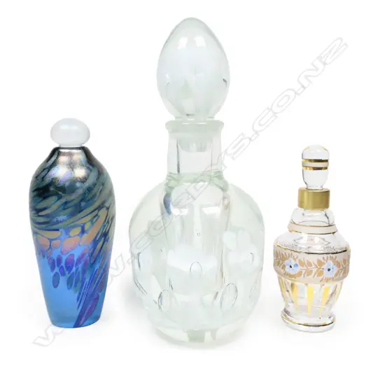 Three assorted perfume bottles,