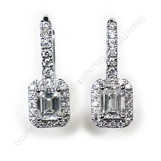 A pair of 18ct white gold and diamond earrings,